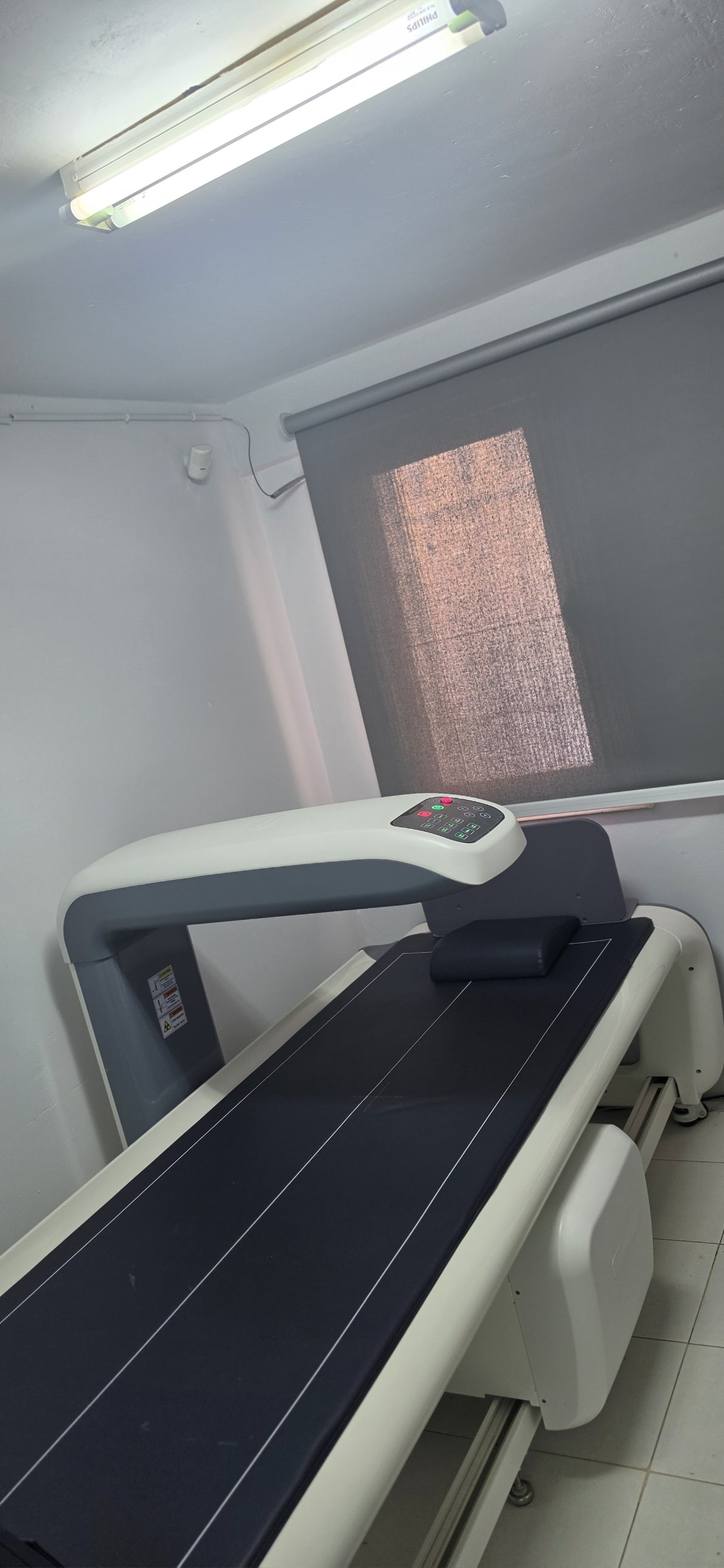 DXA examination table and arm with the control panel
